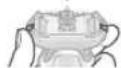PANASONIC ES-LS8A - ▶ Fixation de la section de la grille de protection - 2