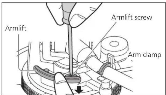 TECHNICS SL-1200M7B - Return the tone arm to the arm rest, clamp it with the arm clamp and while pressing the armlift down with your finger, turn the screw to adjust the height. - 1