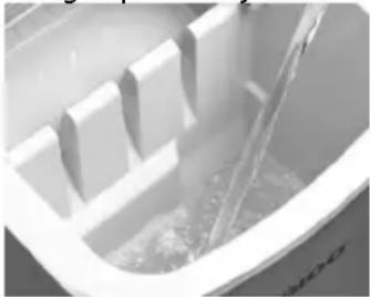 Igloo ICEB26CP - USO DE LA MÁQUINA AUTOMÁTICA PARA PREPARAR HIELO - 1