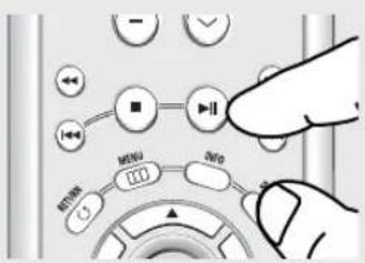 Hand interacting with a control panel showing buttons, sliders, and a play button labeled 'MENU' and 'JUO'