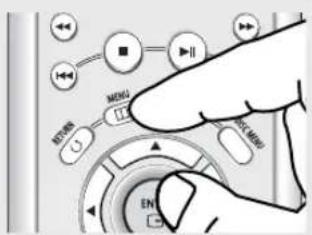Hand interacting with a device control panel showing buttons labeled 'MENU', 'EN', and 'NOT MIND'