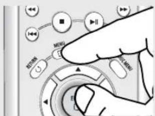 Hand interacting with a device control panel showing buttons, playback, and mode options