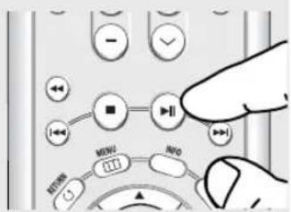 Close-up of a device control panel with labeled buttons and a hand pointing to a button, showing text labels like 'MENU', 'INFO', and 'NOT'.