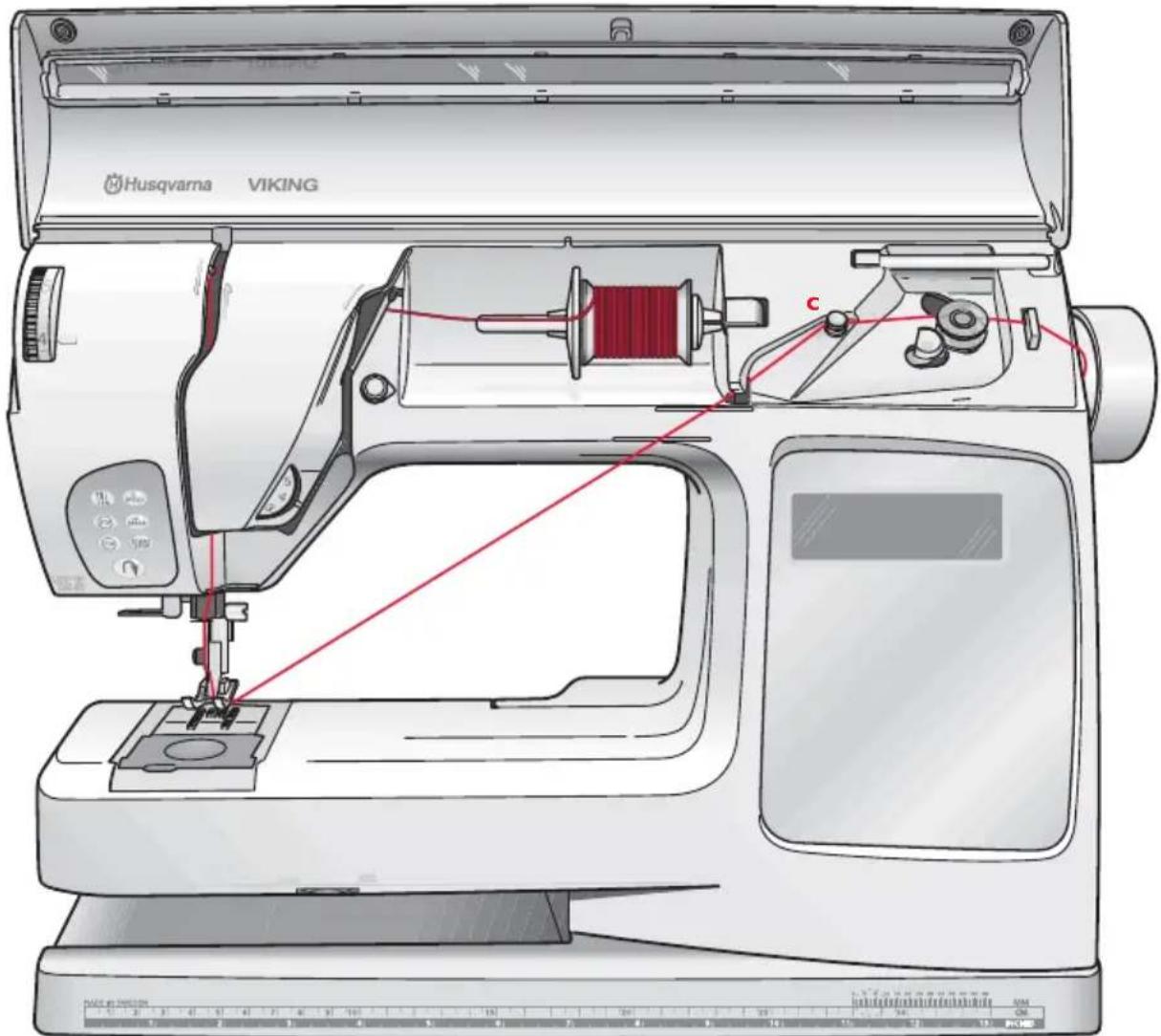 Husqvarna-Viking Platinum 995E - Installer la canette dans la machine - 3
