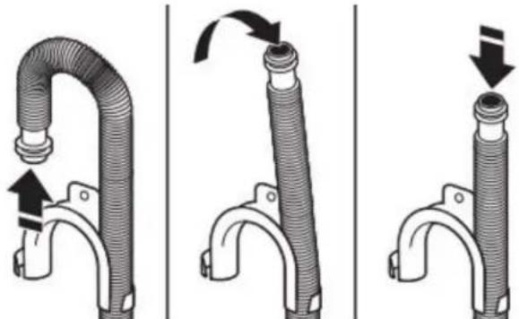 AMANA ATW4516MW - Enlever la bride de retenue pour tuyau de vidange (installations avec vidange au plancher seulement) - 1