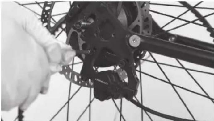 SHARP BK-RS08ES - Pasul 13: Îndepărtați capacul cablului, etrierul de frână din spate și roata din spate - 1
