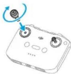 Dessin au trait d'un appareil portable avec molette et bouton circulaire, sans texte ni symboles