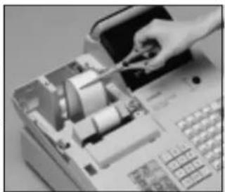 CASIO CE-310 - Remplacement du papier pour journal - 6