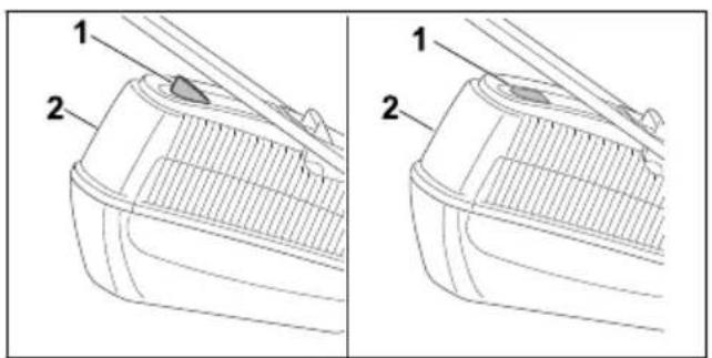 STIHL RM 248 T - Vidage du bac de ramassage - 1
