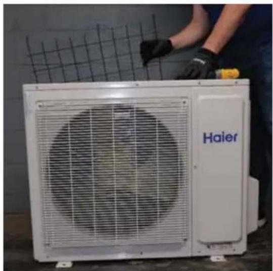 HAIER Tempo 1U3036TL2HFA - Kit de Temperatura Ambiente Baja (cont.)   Instalación de Protector de Nieve Trasero - 1