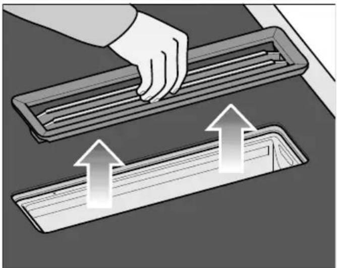 MIELE KMDA 7473-1 FL - Retirer la grille de recouvrement - 1