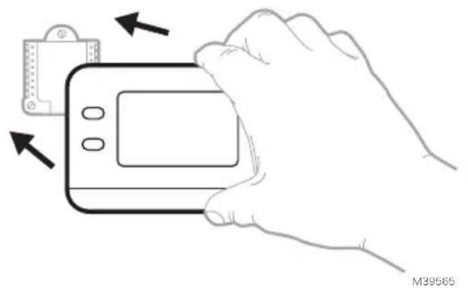 HONEYWELL RTH11B - Attach the thermostat. - 1