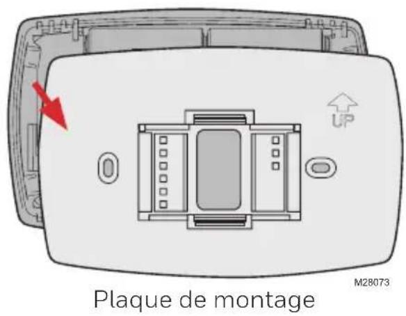 HONEYWELL RTH7600D - Séparer la plaque murale du nouveau thermostat - 1