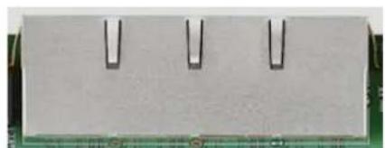 Close-up of a microchip or integrated circuit board with three vertical slots (no visible text or symbols)