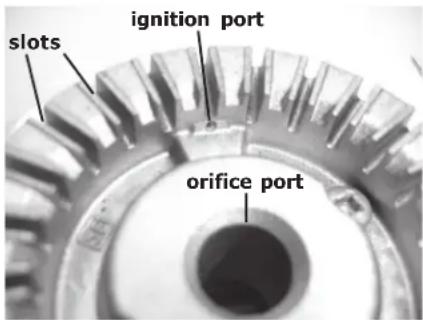 slots ignition port orifice port