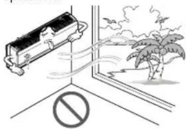Safety warning illustration showing a spray gun spraying water near a palm tree, with a prohibition symbol below.