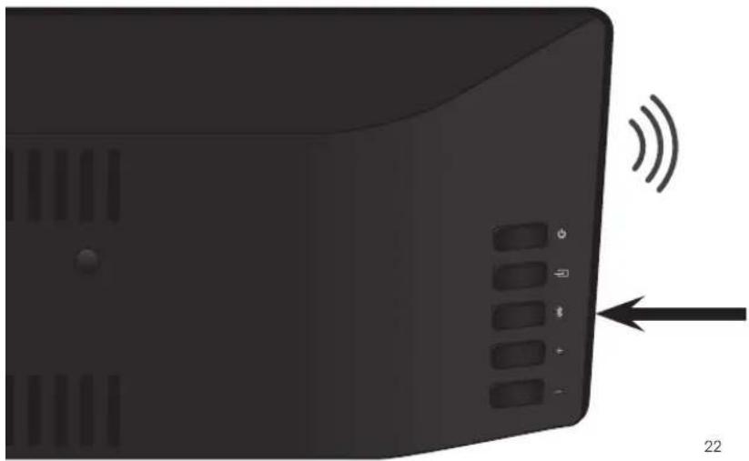 Black electronic device rear panel with ventilation slots and an arrow pointing to it, labeled '22' (no text or symbols on the device itself)