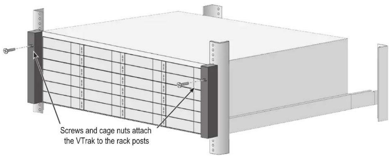 Screws and cage nuts attach the VTrak to the rack posts