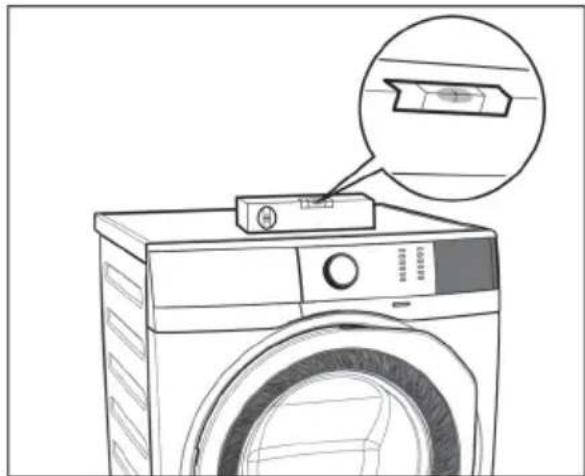 Line drawing of a washing machine with a close-up inset showing a component detail (no text or symbols).