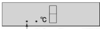 Diagram showing a temperature measurement setup with a thermometer and a rectangular box, likely illustrating a thermal or chemical process.
