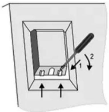 Diagram showing a screwdriver inserted into a rectangular component with labeled parts and directional arrows indicating movement or force.