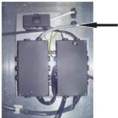 Close-up of two black electronic components with wires and connectors, no visible text or symbols