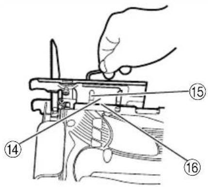 Technical diagram showing a hand operating a mechanical device with numbered parts labeled 14, 15, and 16.