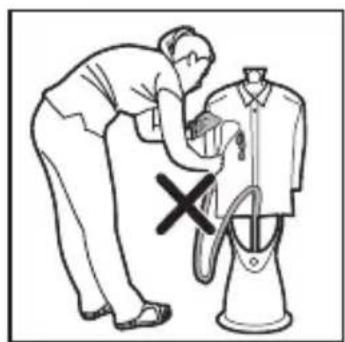 Illustration of a person using a hairdryer to clean a shirt, with a cross mark indicating the washing machine (no text or symbols present)
