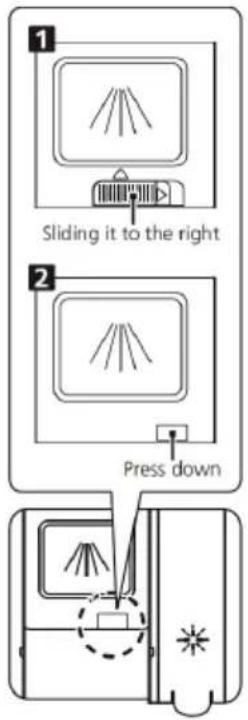 Sliding it to the right Press down