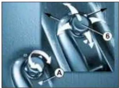 Close-up of mechanical components with arrows indicating motion or rotation, no visible text or symbols