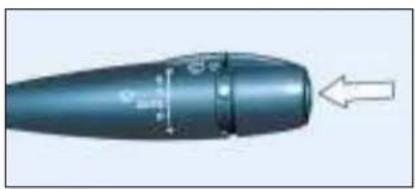 Close-up of a metallic cylindrical object with a pointed tip and arrow indicator (no text or symbols)
