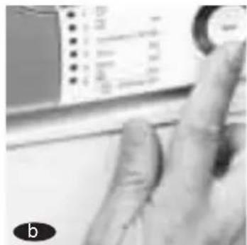 Close-up of a hand pointing at a computer screen displaying a list of items, likely for a software interface or app.
