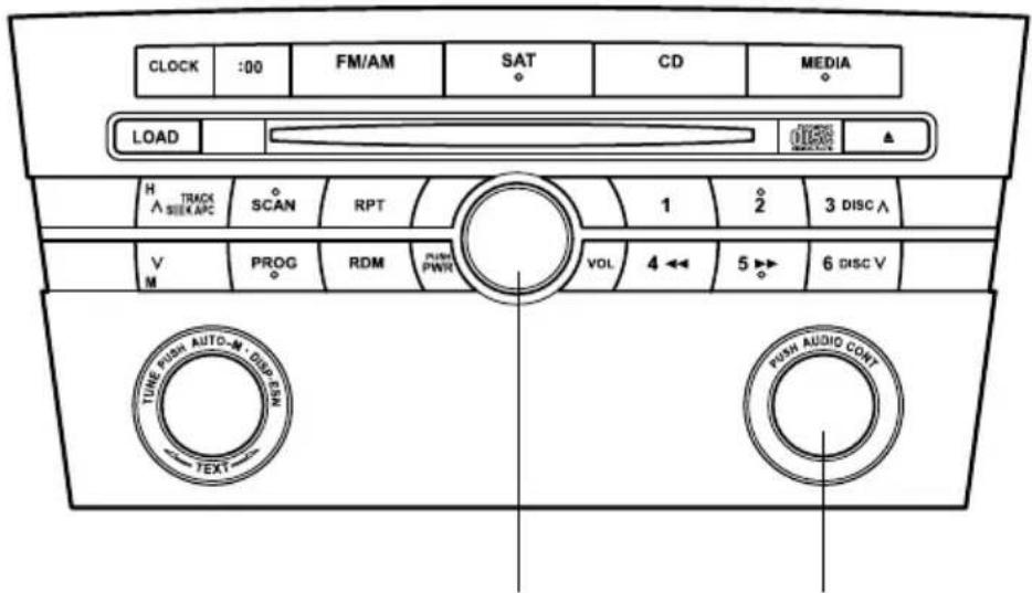 CLOCK :00 FM/AM SAT CD MEDIA LOAD H TRACK A SEEK APC SCAN RPT 1 2 3 DISC A V PROG RDM PUSH PWR VOL 4 ← 5 → 6 DISC V TUNE PUSH AUTO-M DISC EM TEXT PUSH AUDIO CONT