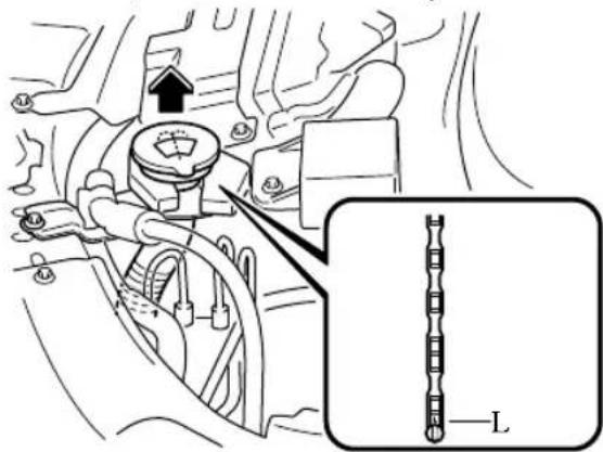 Technical diagram showing mechanical assembly with labeled component 'L' and directional arrow indicating motion