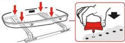 Diagram illustrating a hand using a tool to press down a device with red arrows indicating downward motion.