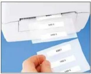 Hand holding up a white card with printed labels, likely for a document or receipt.