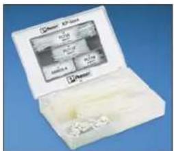 Product photo of a white electronic device with printed labels and internal components, likely a battery or sensor module.