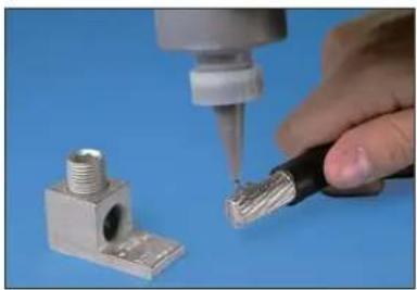 Panduit STS2 - Clean the exposed conductor using a wire brush or an emery cloth. - 1