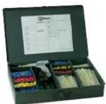Open industrial storage box with labeled compartments and a small diagram on top