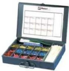 Open industrial tool kit with labeled compartments and a grid of modules, showing various colored components.
