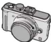 PANASONIC Lumix H-H020 - Nastavte červené značky na objektivu Ⓑ a těle fotoaparátu proti sobě a otáčejte objektivem ve směru šipky, dokud nezaklapne. - 1