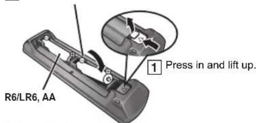 R6/LR6, AA 1 Press in and lift up.