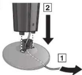 Diagram showing a mechanical setup with labeled parts 1 and 2, indicating directional movement or force vectors.