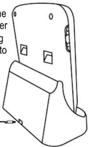 Line drawing of a mechanical device with mounting holes and a base component (no text or symbols)