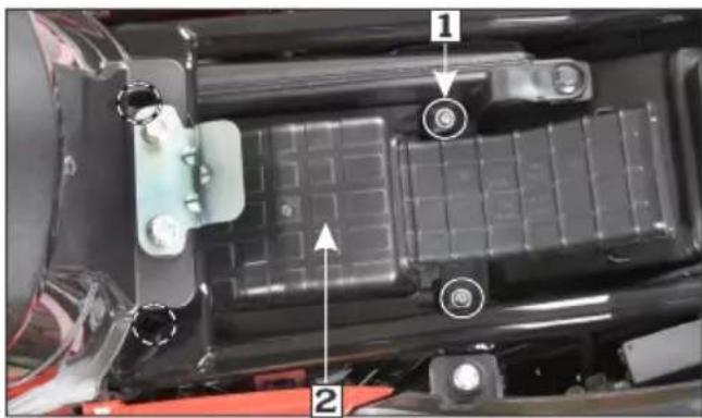 Technical diagram of a battery pack assembly with numbered components and directional arrows indicating parts of the component.