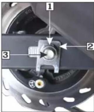 Labeled mechanical component diagram showing three parts with arrows indicating assembly or movement