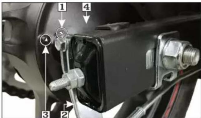 Technical diagram of a vehicle brake system with numbered components and directional arrows indicating assembly or repair.