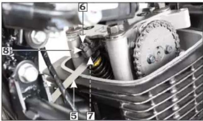 Technical diagram of a mechanical assembly with numbered parts labeled 5, 6, 7, and 8