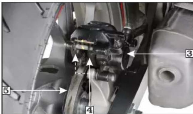 Technical diagram of a mechanical assembly with numbered components and directional arrows indicating motion or force directions.