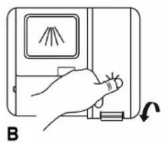 Hand pressing a button on a device with a slide and a scroll, labeled 'B' (no text or symbols on the diagram itself)